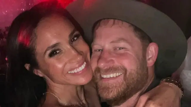 'Video thumbnail for Meghan & Harry's Latest PDA Has Royal Fans Buzzing'