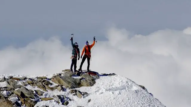 'Video thumbnail for Climbers smash 21-year Alps record with 15.5-hour triple north face ascent'