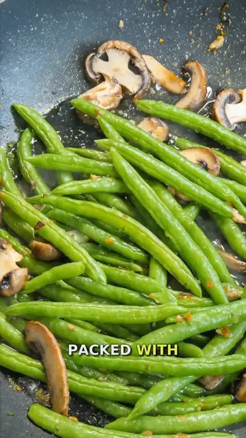 'Video thumbnail for Garlic Butter Sautéed Green Beans and Mushrooms'
