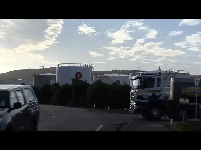 'Video thumbnail for Wind Turbines & Petroleum Tanks'