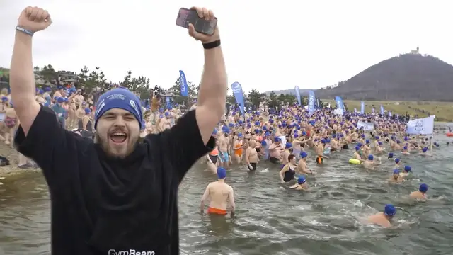 'Video thumbnail for Brave swimmers take the plunge in largest polar bear dip'