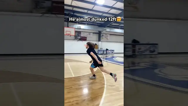 'Video thumbnail for Incredible Vertical: Man Almost Dunks on 12ft Basketball Hoop'