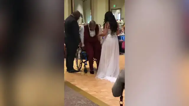 'Video thumbnail for Groom Rises From Wheelchair To Dance With Bride | Happily TV'