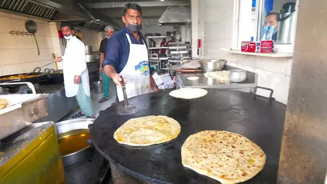 'Video thumbnail for 7 a.m. PAKISTANI BREAKFAST in Muscat, Oman!! Halwa Puri, Chana Dal & Shami Kebab'