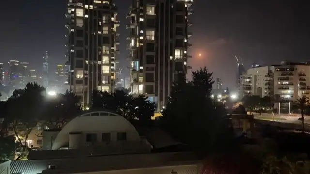 'Video thumbnail for WATCH: Terrifying moment Iranian missiles rain down on Tel Aviv as Israelis rush for safety'