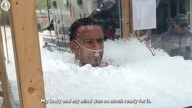 'Video thumbnail for Man spends over four hours submerged in ice'