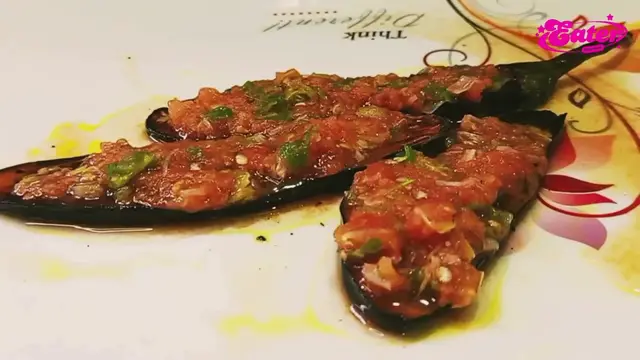 'Video thumbnail for Spicy Tomato Sauce Covered Eggplant Recipe'