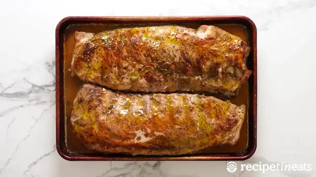 'Video thumbnail for Fall-Off-The-Bone Oven Baked Pork Ribs with Sticky BBQ Sauce (Easy & No Grill Needed!)'