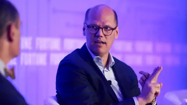 'Video thumbnail for Bayer's move to cut middle managers was not "slash and burn," exec says'