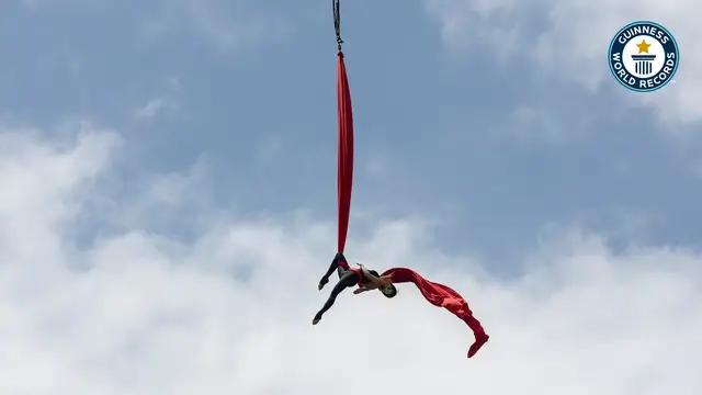 'Video thumbnail for Erika Lemay sets world record for blindfolded aerial silk roll'