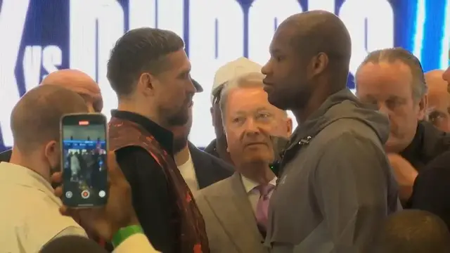 'Video thumbnail for Usyk and Dubois face off as 'low blow shot' talk takes over press conference'
