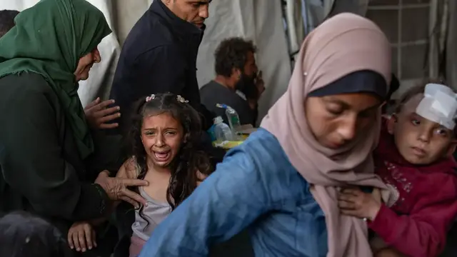 'Video thumbnail for Palestinians from Shuja’iyya forced to flee, seeking safety in Gaza City'