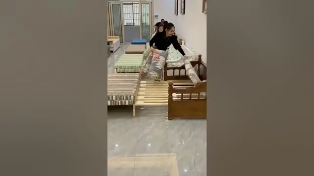 'Video thumbnail for Beautiful Wooden Sofa cum Bed | Furniture #shorts'