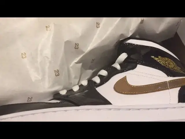 'Video thumbnail for Quick Look At the Air Jordan 1 Mid Metallic Gold Patent Leather, Buy It Now'