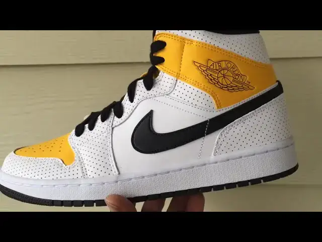 'Video thumbnail for Quick Look At The Air Jordan 1 Mid Perforated White University Gold & Buy It Now'