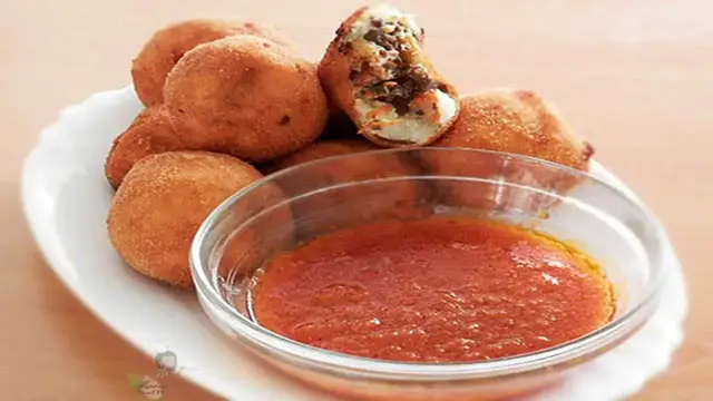 'Video thumbnail for Meat Stuffed Potato (yam) Balls'